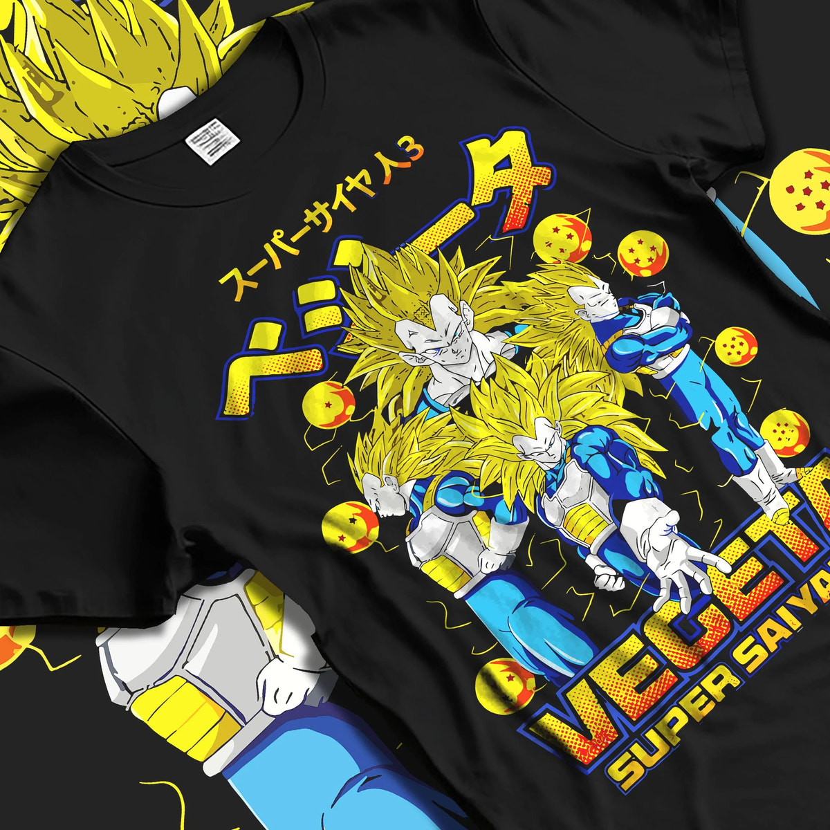 Black T-shirt laid flat with natural folds featuring Vegeta Super Saiyan 3 golden power Dragon Ball artwork.
