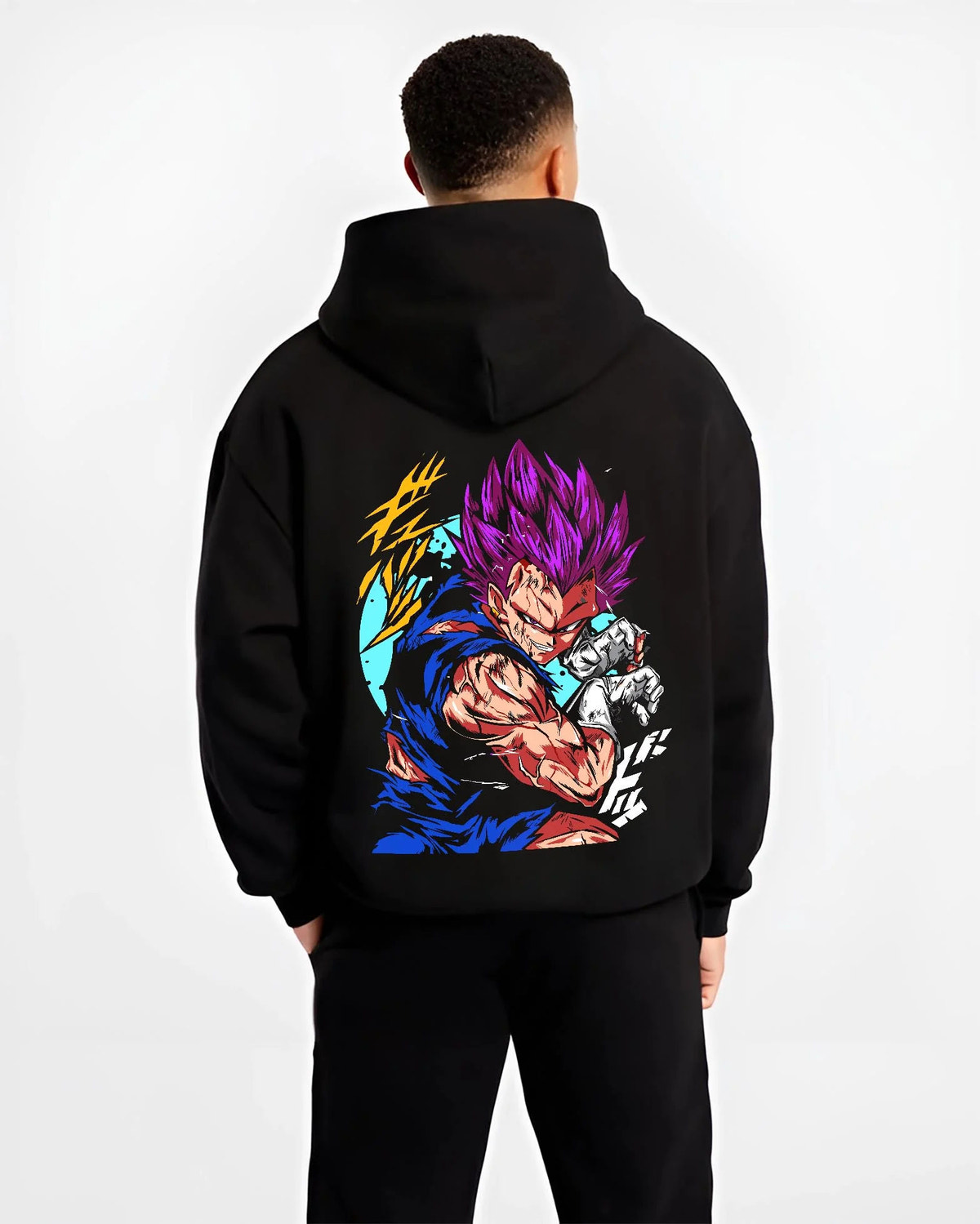 Black hoodie worn by male model from the back featuring Vegeta Ultra Ego purple destruction power Dragon Ball Super artwork.