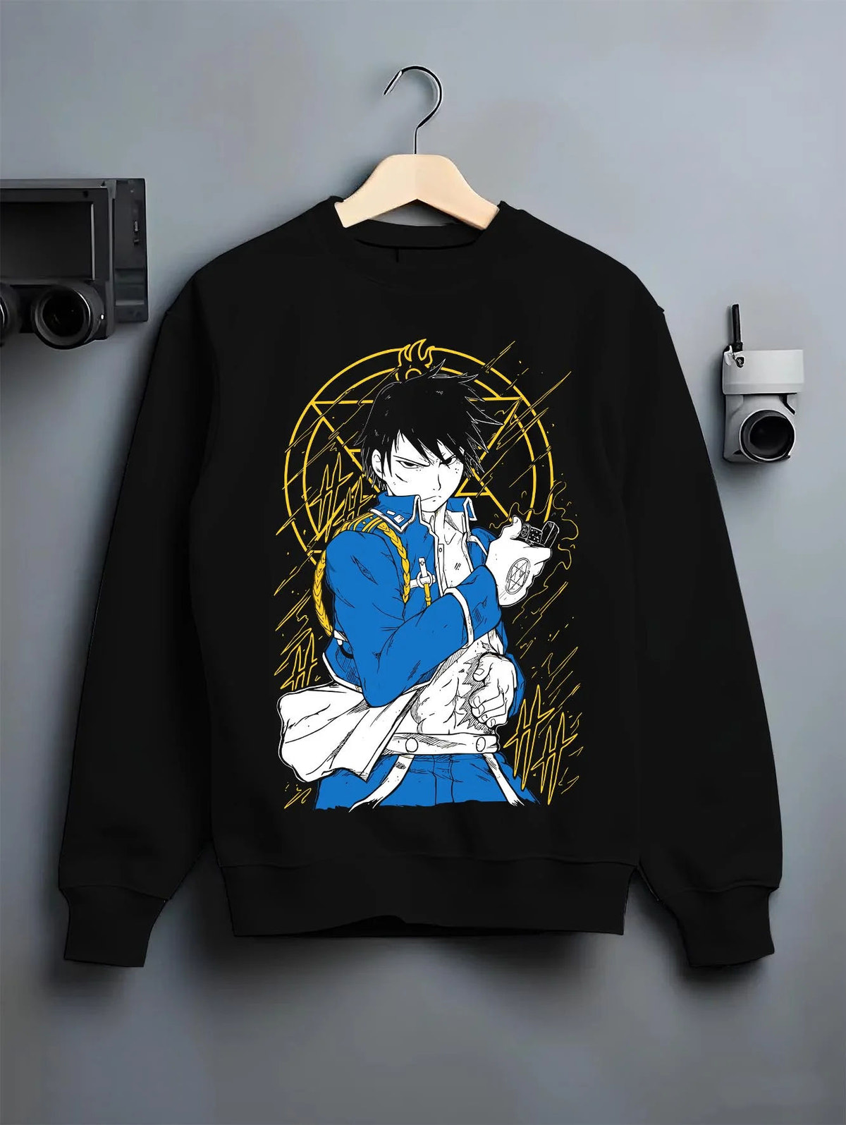 Black crewneck sweatshirt on hanger featuring Roy Mustang Flame Alchemist Fullmetal Alchemist artwork.