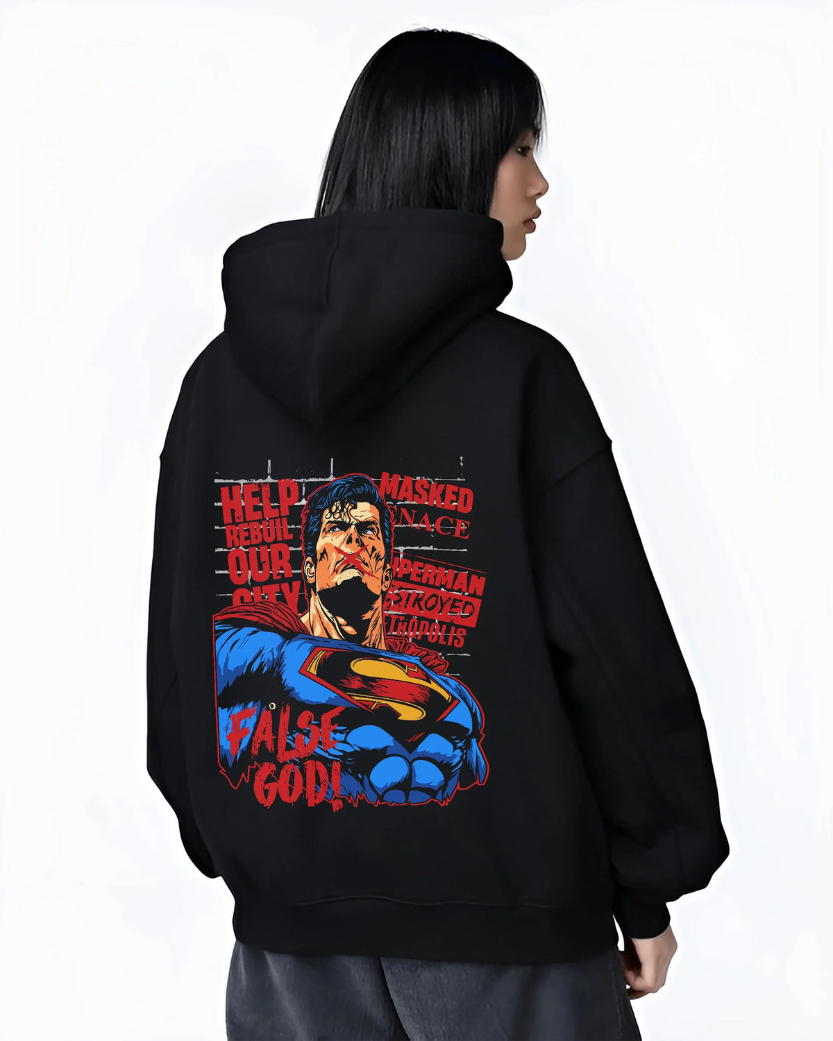 Black hoodie worn by female model from the back featuring Superman False God Man of Steel DC Comics artwork.