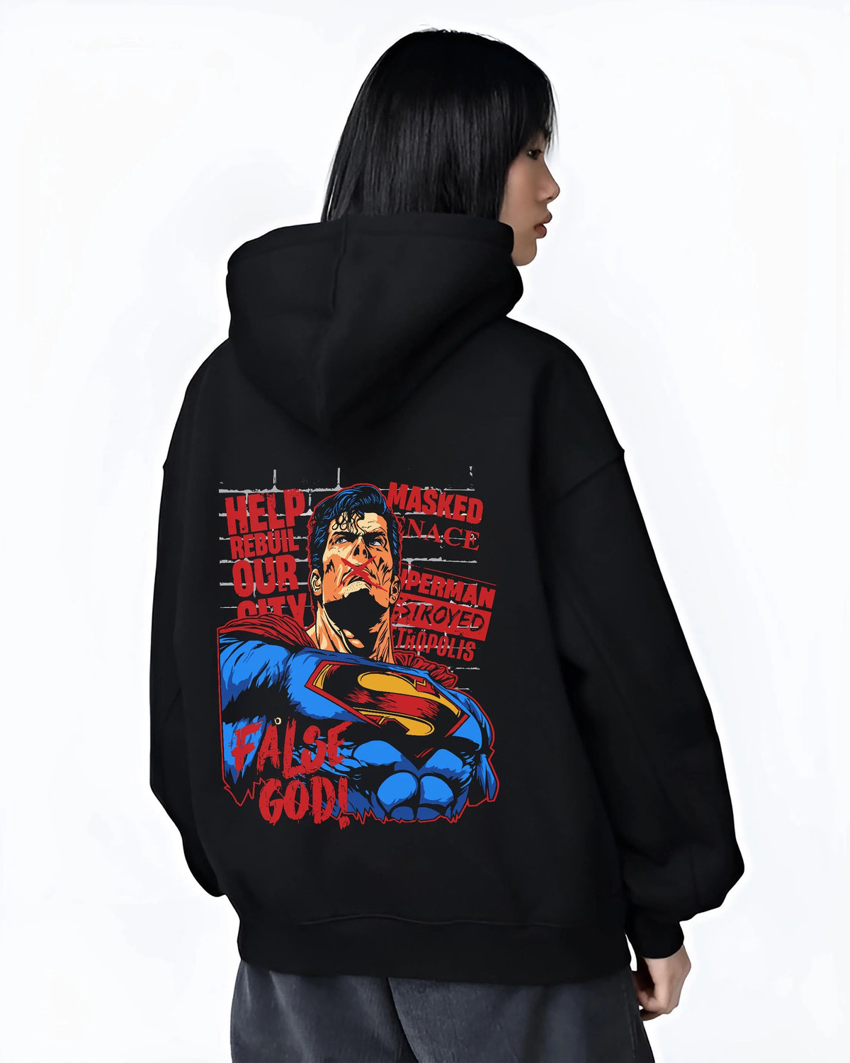 Black hoodie worn by female model from the back featuring Superman False God Man of Steel DC Comics artwork.