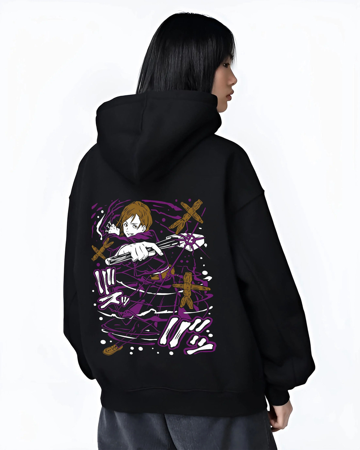 Black hoodie worn by female model from the back featuring Nobara Kugisaki Straw Doll Technique Jujutsu Kaisen artwork.