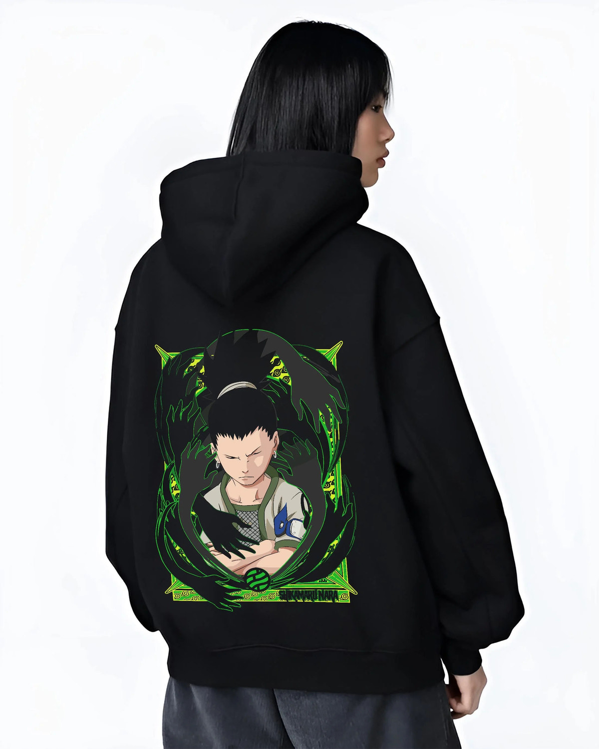 Black hoodie worn by female model from the back featuring Shikamaru Nara Shadow Possession Jutsu Naruto artwork.