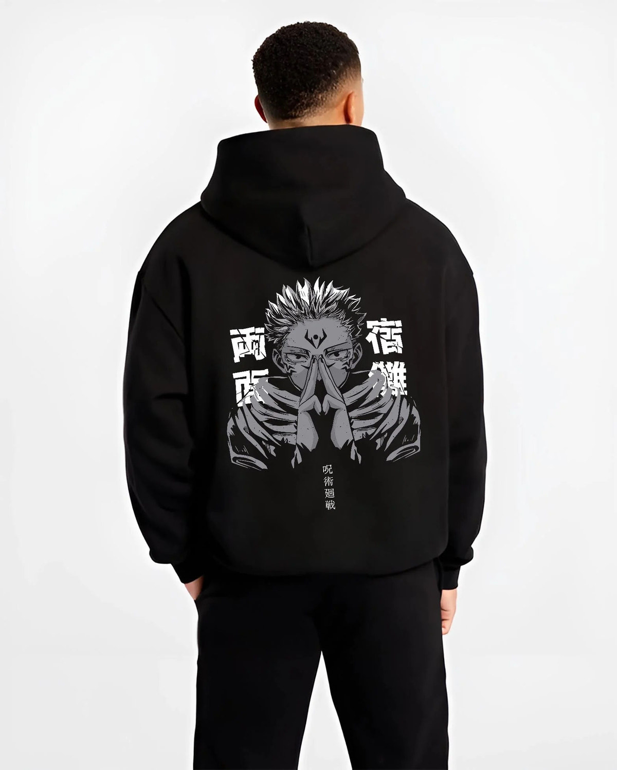 Black hoodie worn by male model from the back featuring Ryomen Sukuna domain hand sign Jujutsu Kaisen artwork.