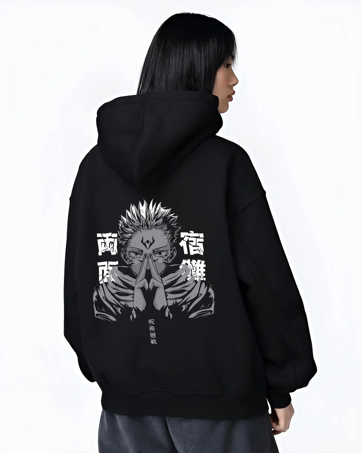 Black hoodie worn by female model from the back featuring Ryomen Sukuna domain hand sign Jujutsu Kaisen artwork.