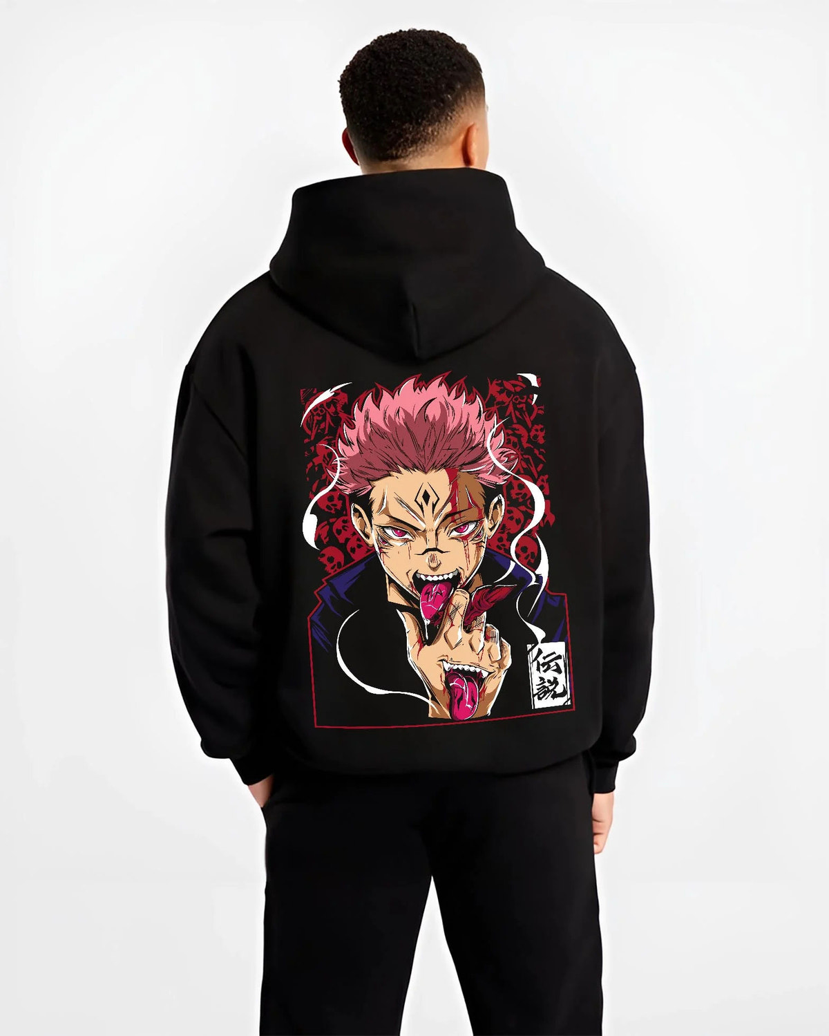 Black hoodie worn by male model from the back featuring Sukuna Yuji possession Jujutsu Kaisen artwork.