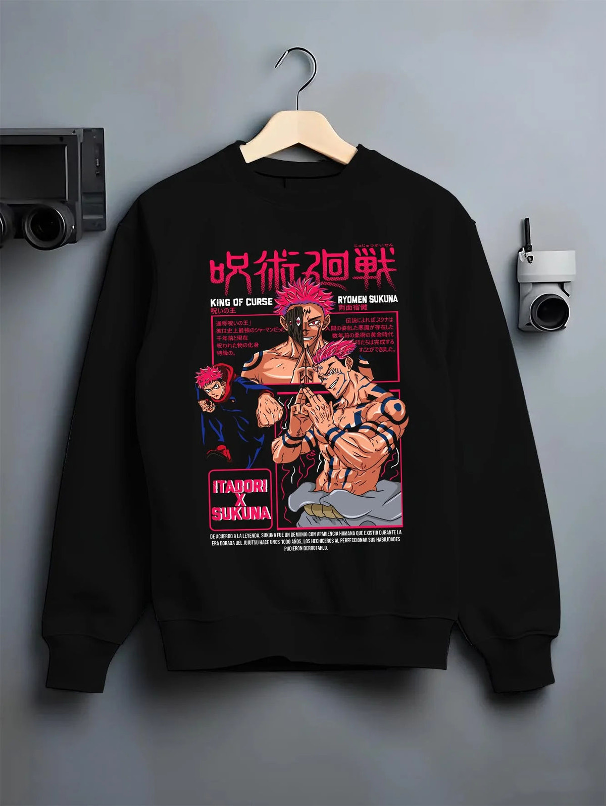 Black crewneck sweatshirt on hanger featuring Ryomen Sukuna Malevolent Shrine Jujutsu Kaisen artwork.