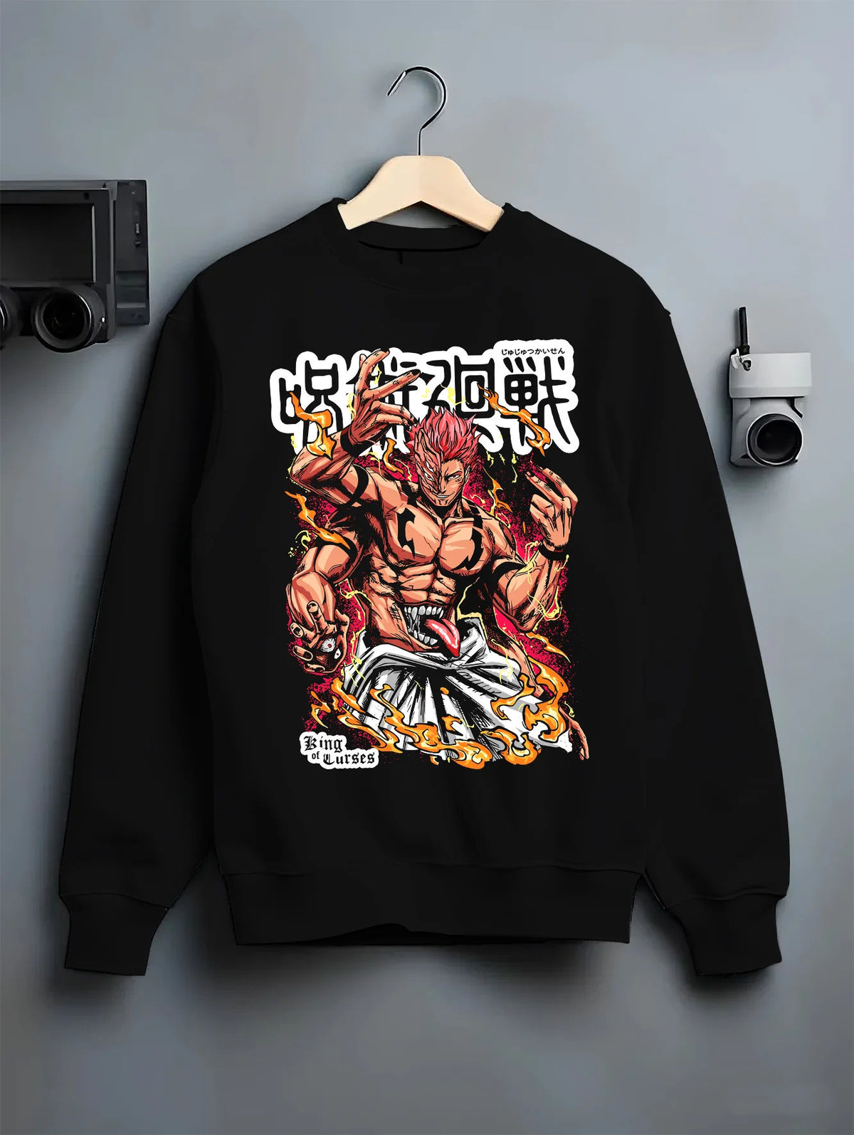 Black crewneck sweatshirt on hanger showing Ryomen Sukuna from Jujutsu Kaisen: muscular fiery portrait