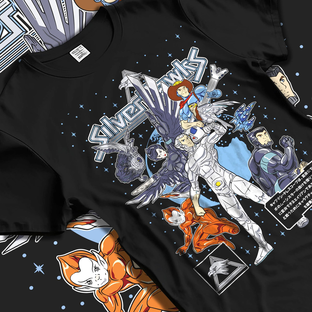 Black T-shirt laid flat with natural folds featuring SilverHawks space hero team artwork.