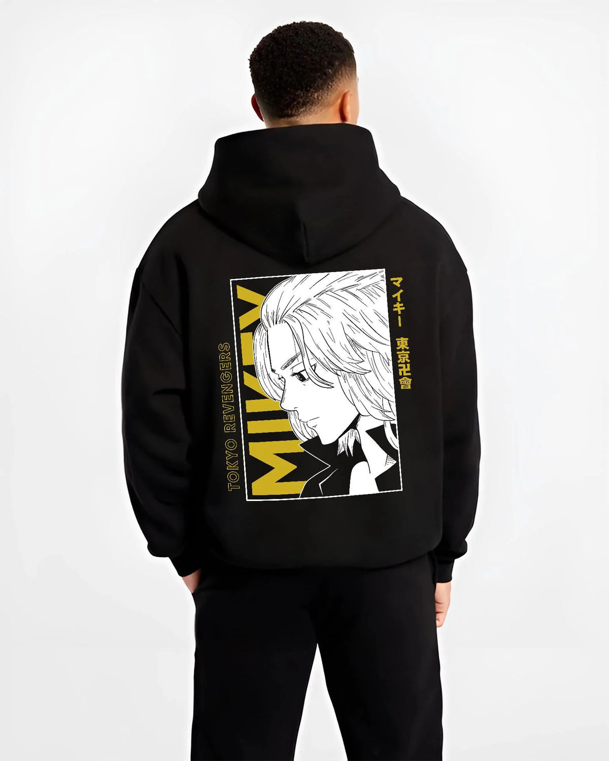 Black hoodie worn by male model from the back featuring Manjiro Sano Mikey Toman leader Tokyo Revengers artwork.