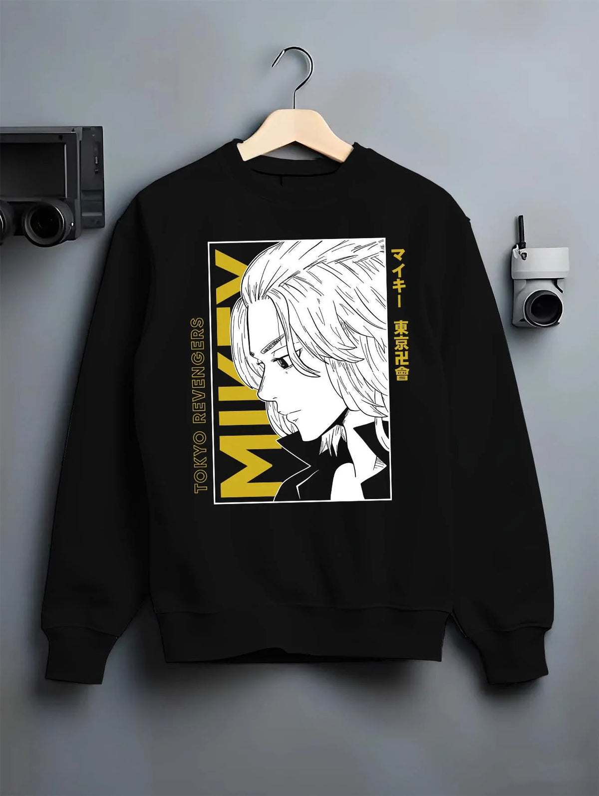 Black crewneck sweatshirt on hanger featuring Manjiro Sano Mikey Toman leader Tokyo Revengers artwork.