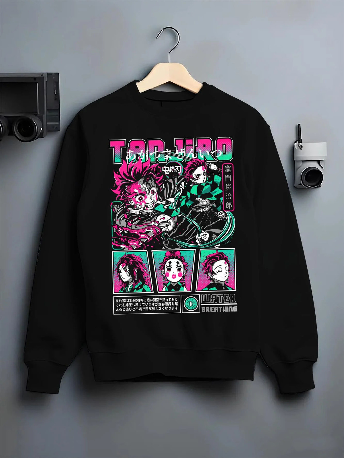 Black crewneck sweatshirt on hanger featuring Tanjiro Kamado Water Breathing sword Demon Slayer artwork.