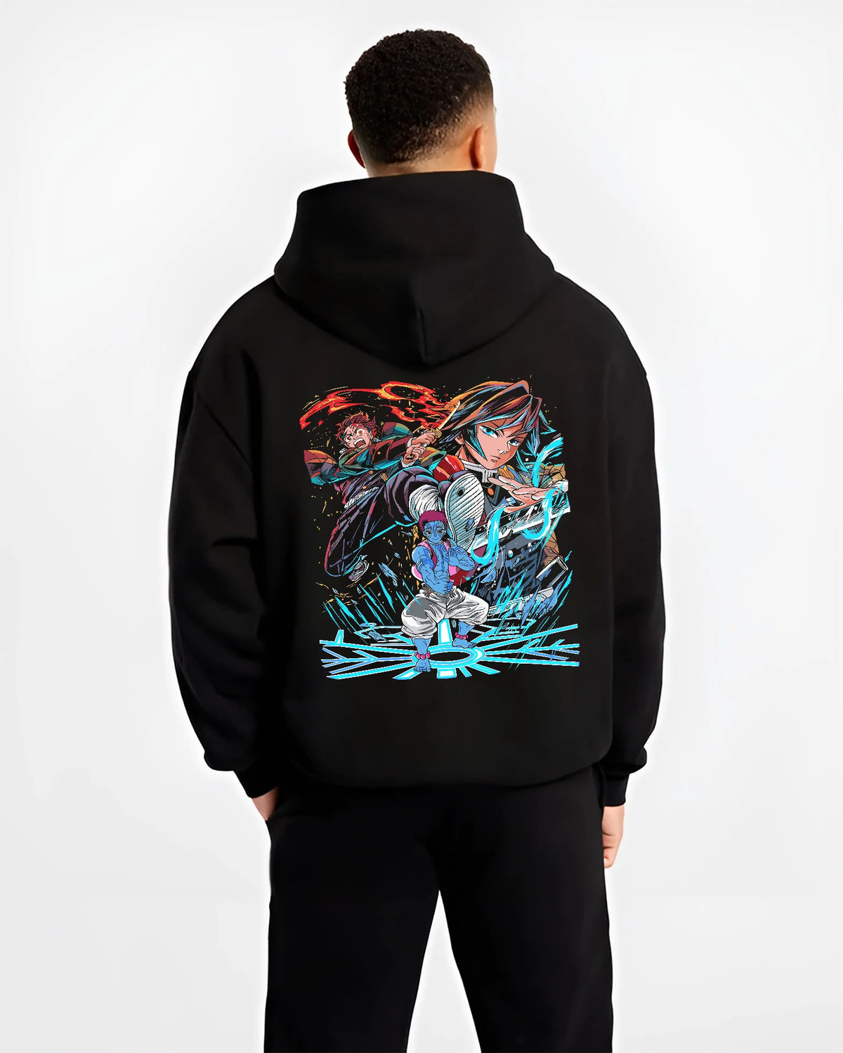 Black hoodie model back view with Tanjiro / Giyu water-breathing artwork from Demon Slayer illustrated back graphic