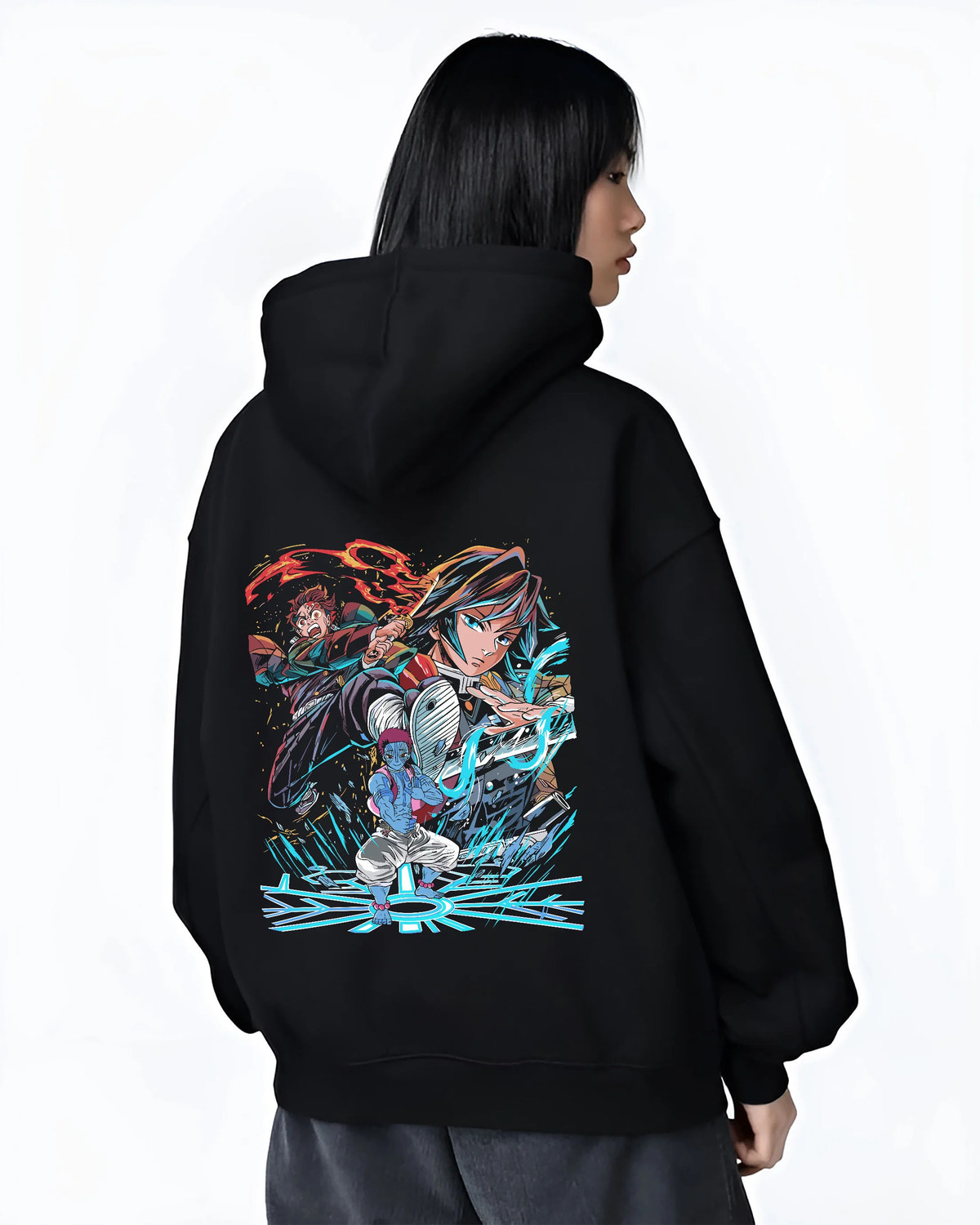 Black hoodie female model back view with Tanjiro / Giyu water-breathing artwork from Demon Slayer illustrated back graphic