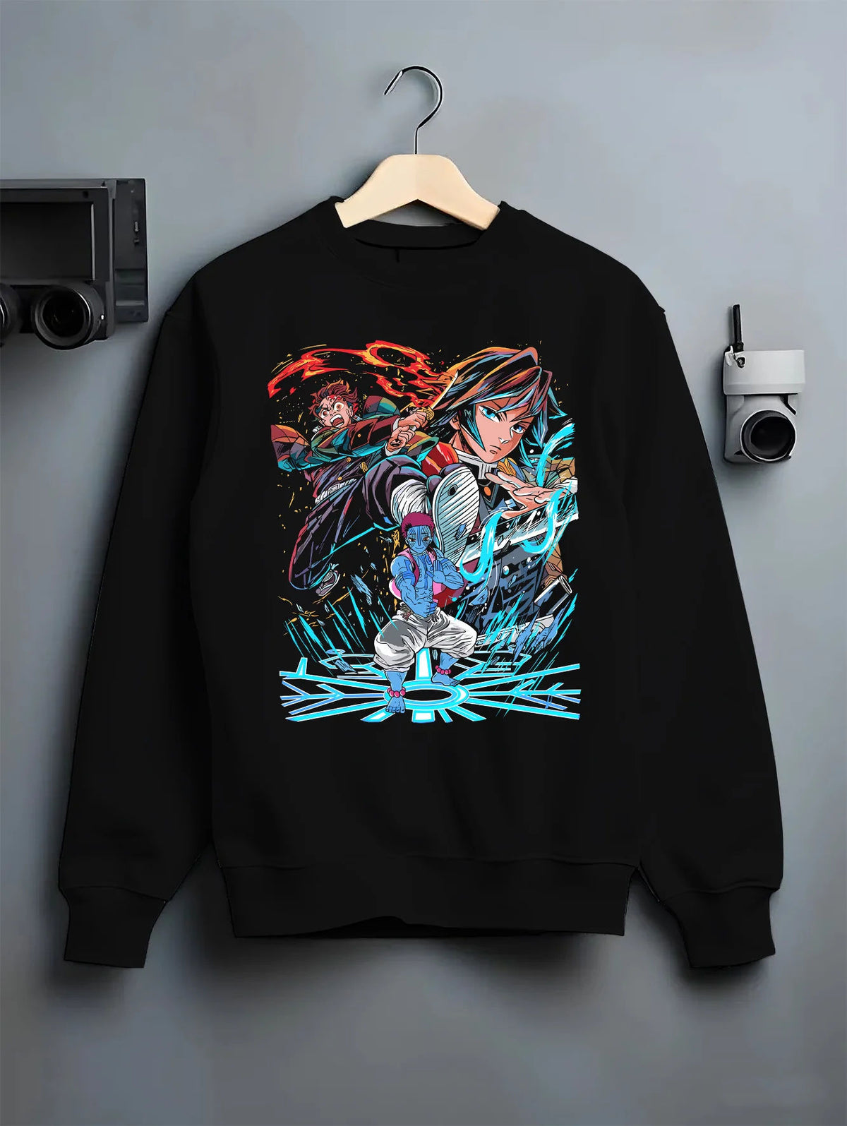 Black crewneck sweatshirt on hanger with Tanjiro / Giyu water-breathing artwork from Demon Slayer illustrated back graphic