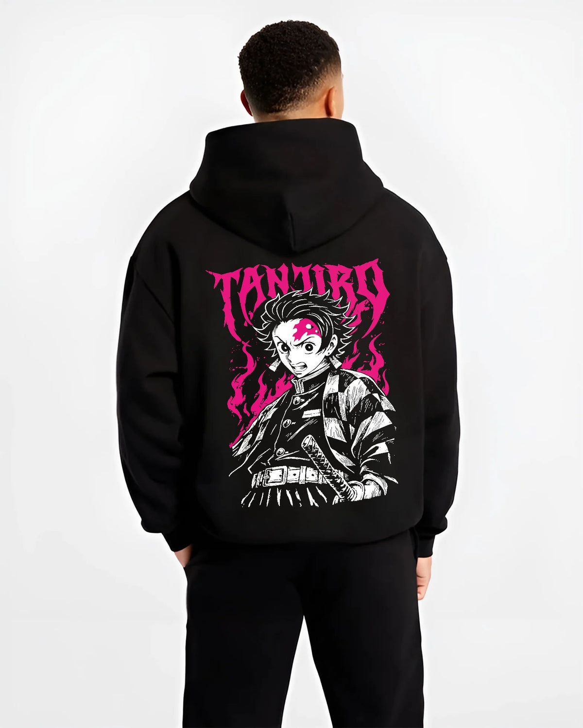 Black hoodie model back view showing Tanjiro Kamado from Demon Slayer: katana monochrome and magenta