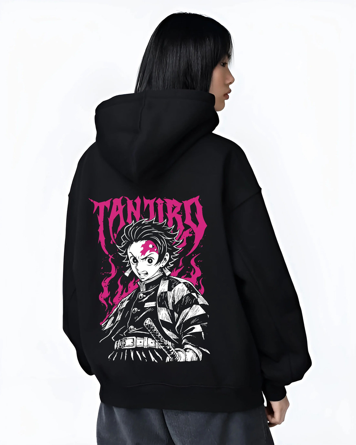 Black hoodie female model back view showing Tanjiro Kamado from Demon Slayer: katana monochrome and magenta