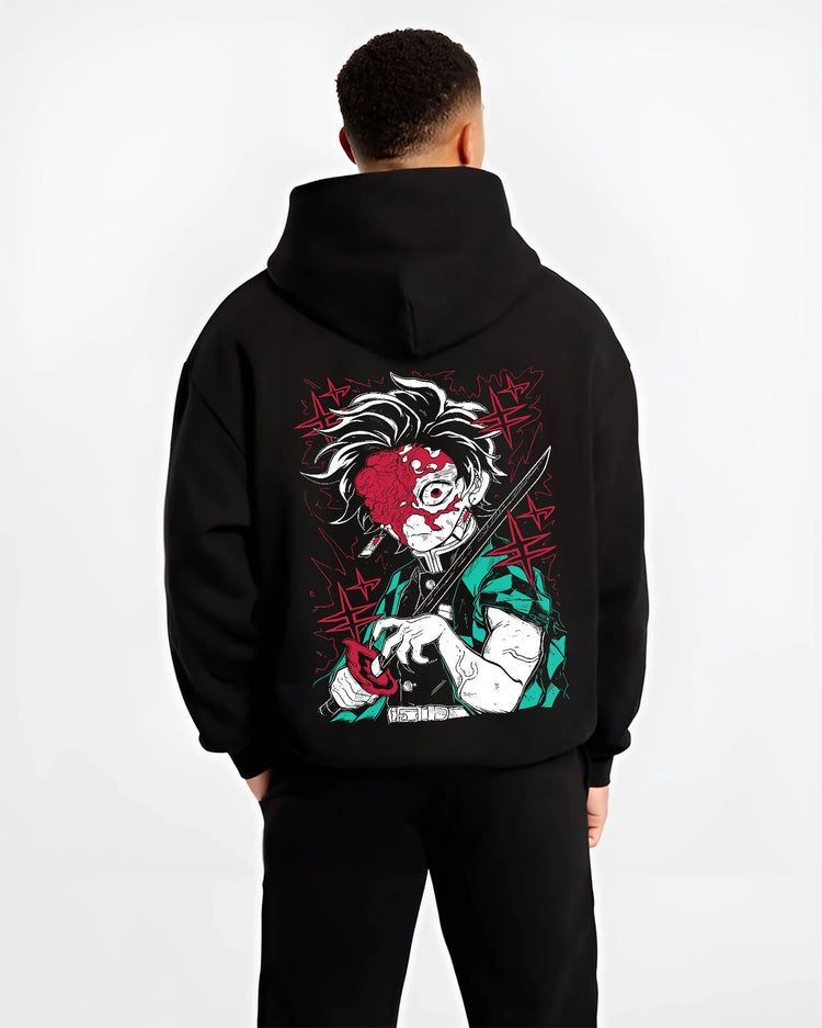 Black hoodie model back view showing Tanjiro Kamado from Demon Slayer: red face and sword close-up