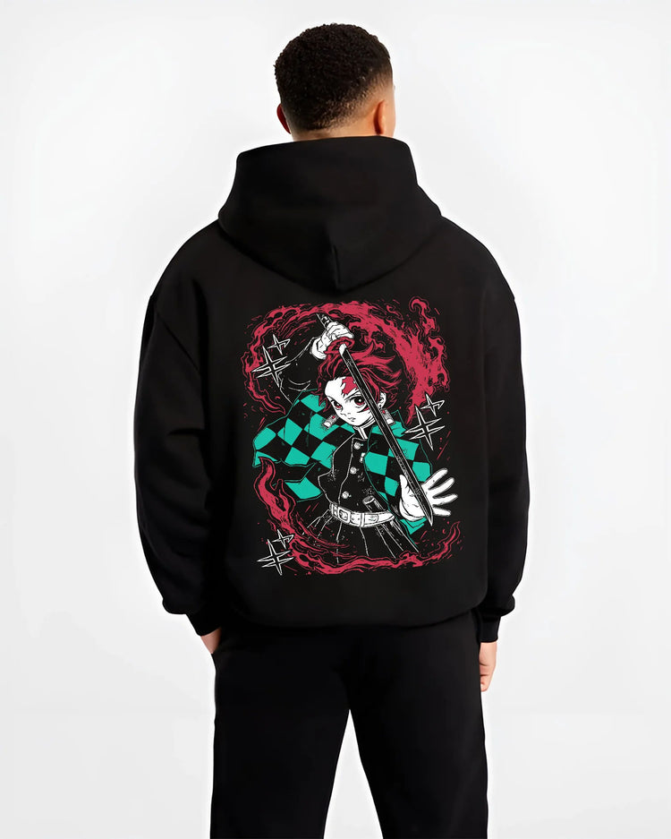 Black hoodie model back view showing Tanjiro Kamado from Demon Slayer: dynamic red-black composition