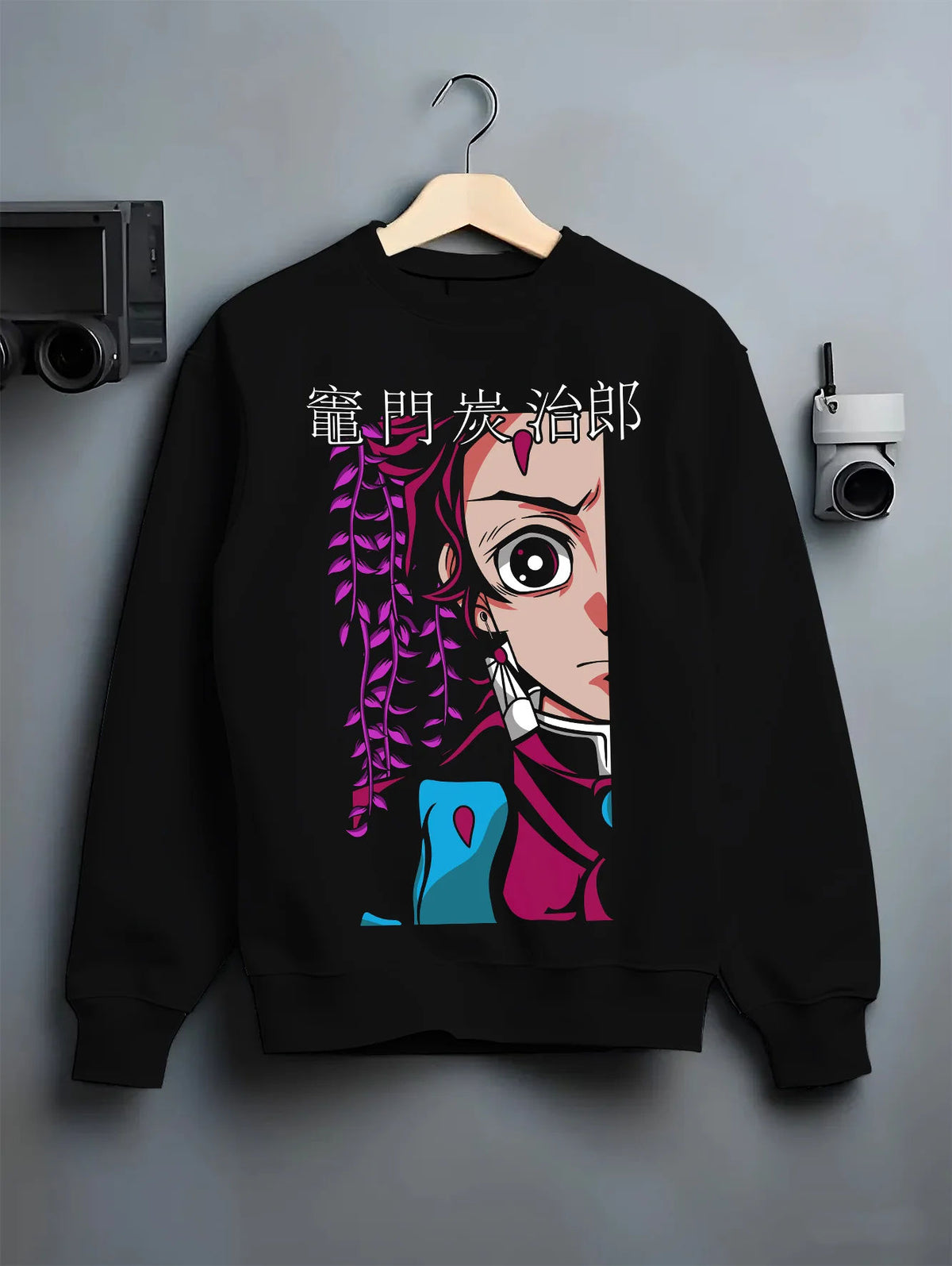 Black crewneck sweatshirt on hanger showing Tanjiro Kamado from Demon Slayer: split portrait