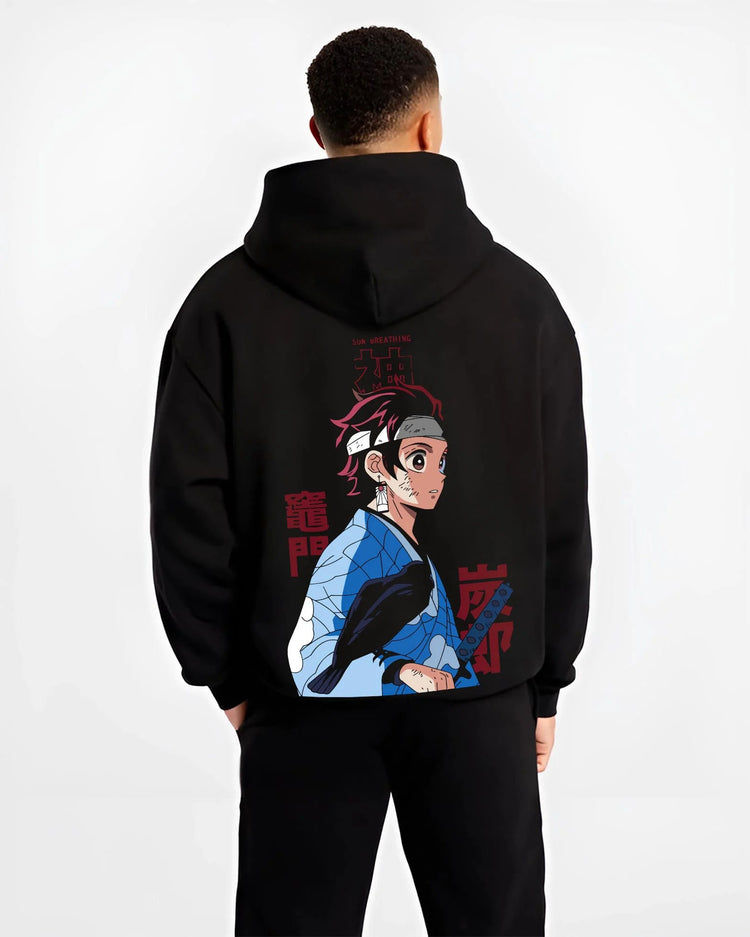 Black hoodie worn by male model from the back featuring Tanjiro Kamado Demon Slayer Mark artwork.