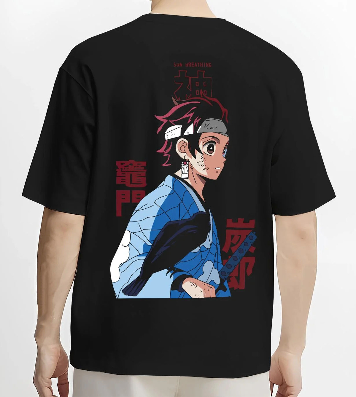 Black T-shirt worn by male model from the back featuring Tanjiro Kamado Demon Slayer Mark artwork.