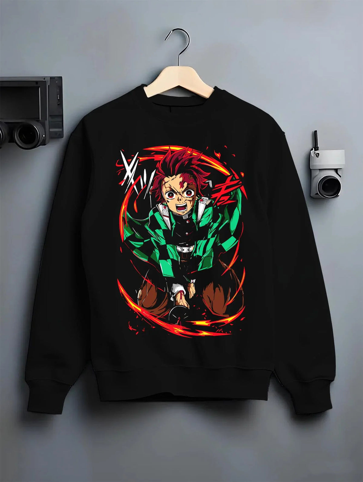 Black crewneck sweatshirt on hanger featuring Tanjiro Kamado Water Wheel breathing Demon Slayer artwork.