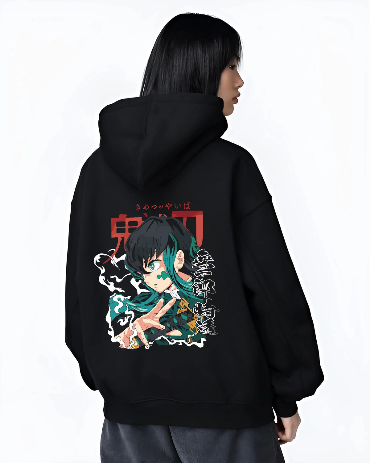 Black hoodie worn by female model from the back featuring Muichiro Tokito Mist Hashira teal portrait Demon Slayer artwork.