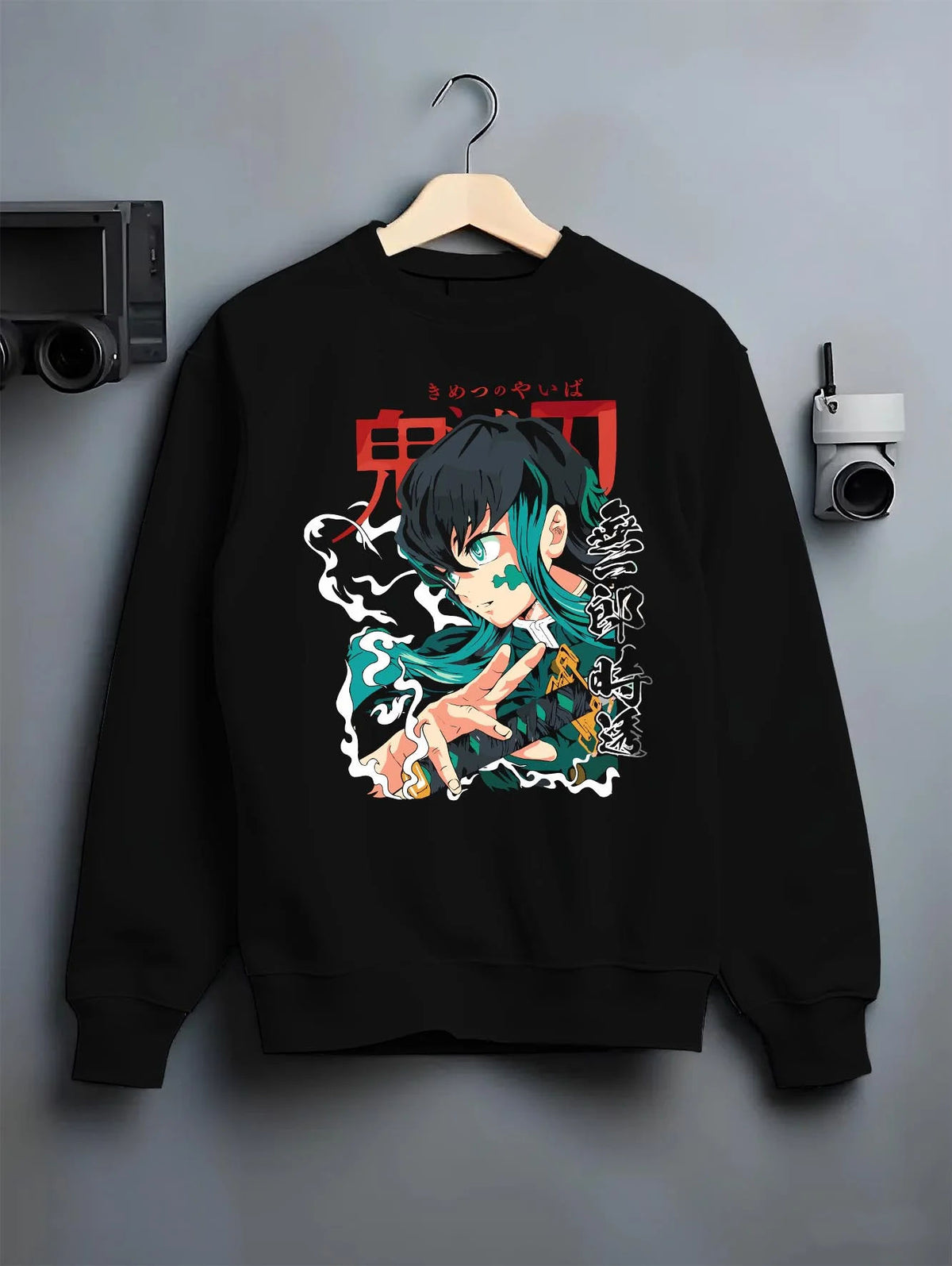 Black crewneck sweatshirt on hanger featuring Muichiro Tokito Mist Hashira teal portrait Demon Slayer artwork.