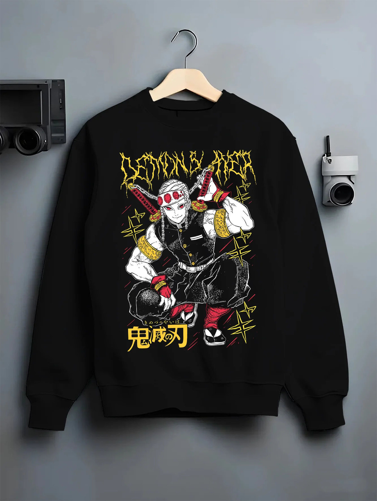 Black crewneck sweatshirt on hanger showing Tengen Uzui from Demon Slayer: crouching yellow/black print