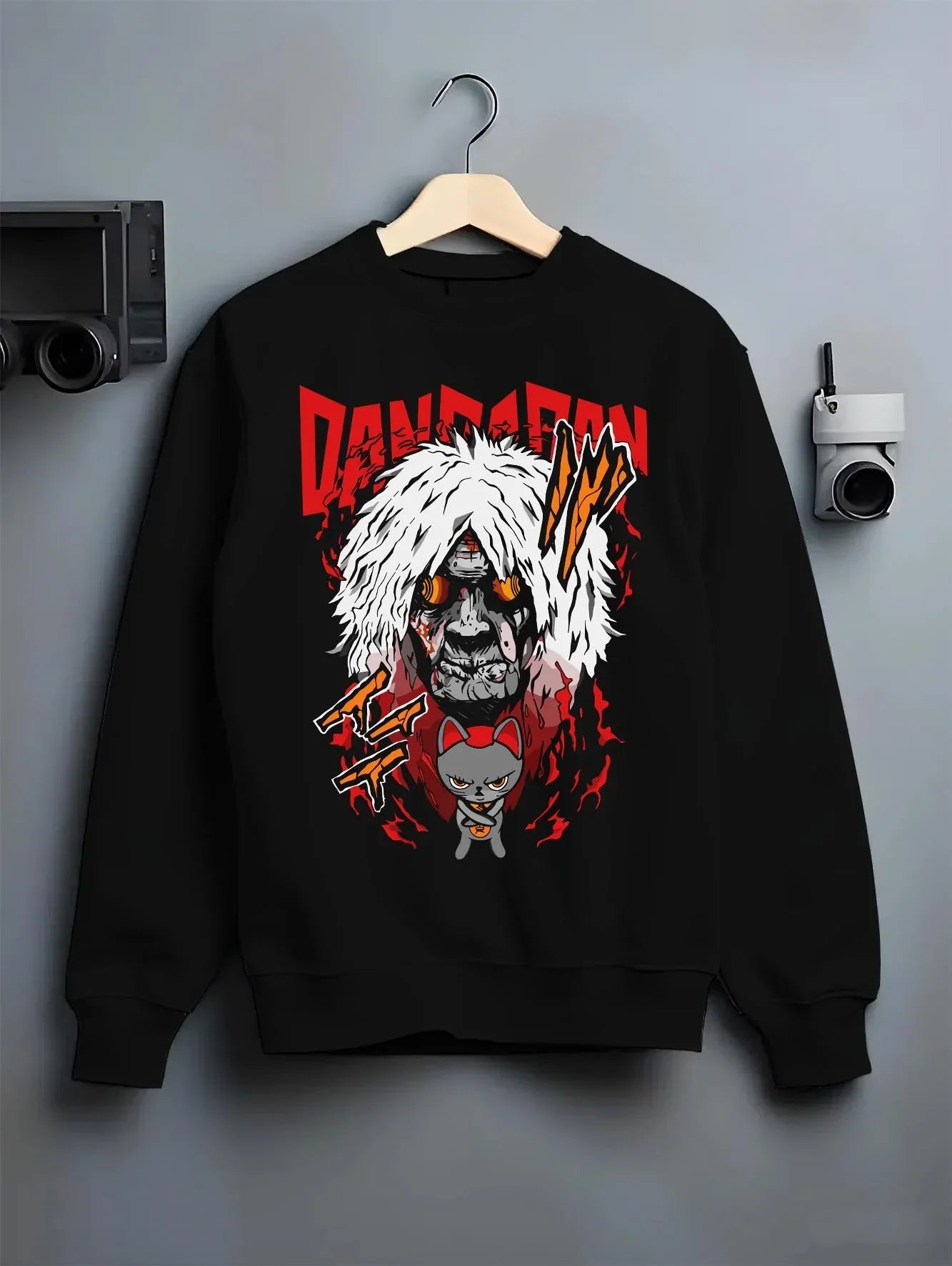 Black crewneck sweatshirt on hanger with Reiko Hoodie Dandadan Spirit Medium Anime Battle graphic premium wear.
