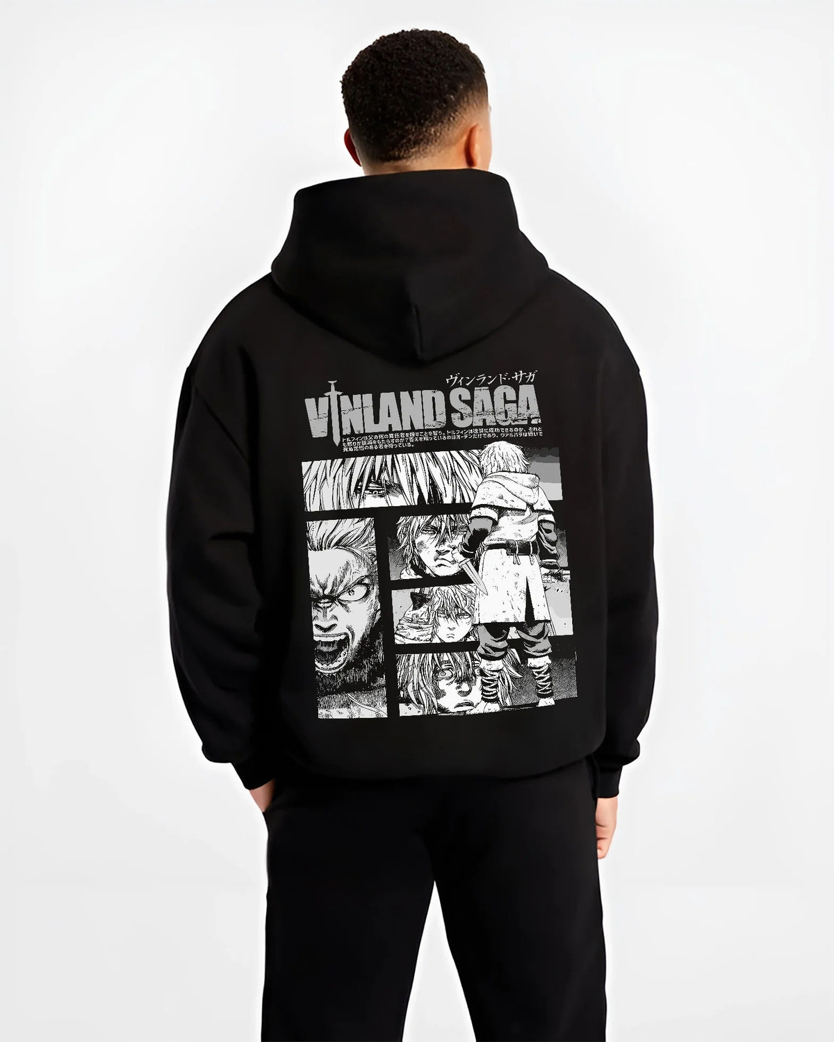 Black hoodie model back view showing Vinland Saga: black-and-white character collage