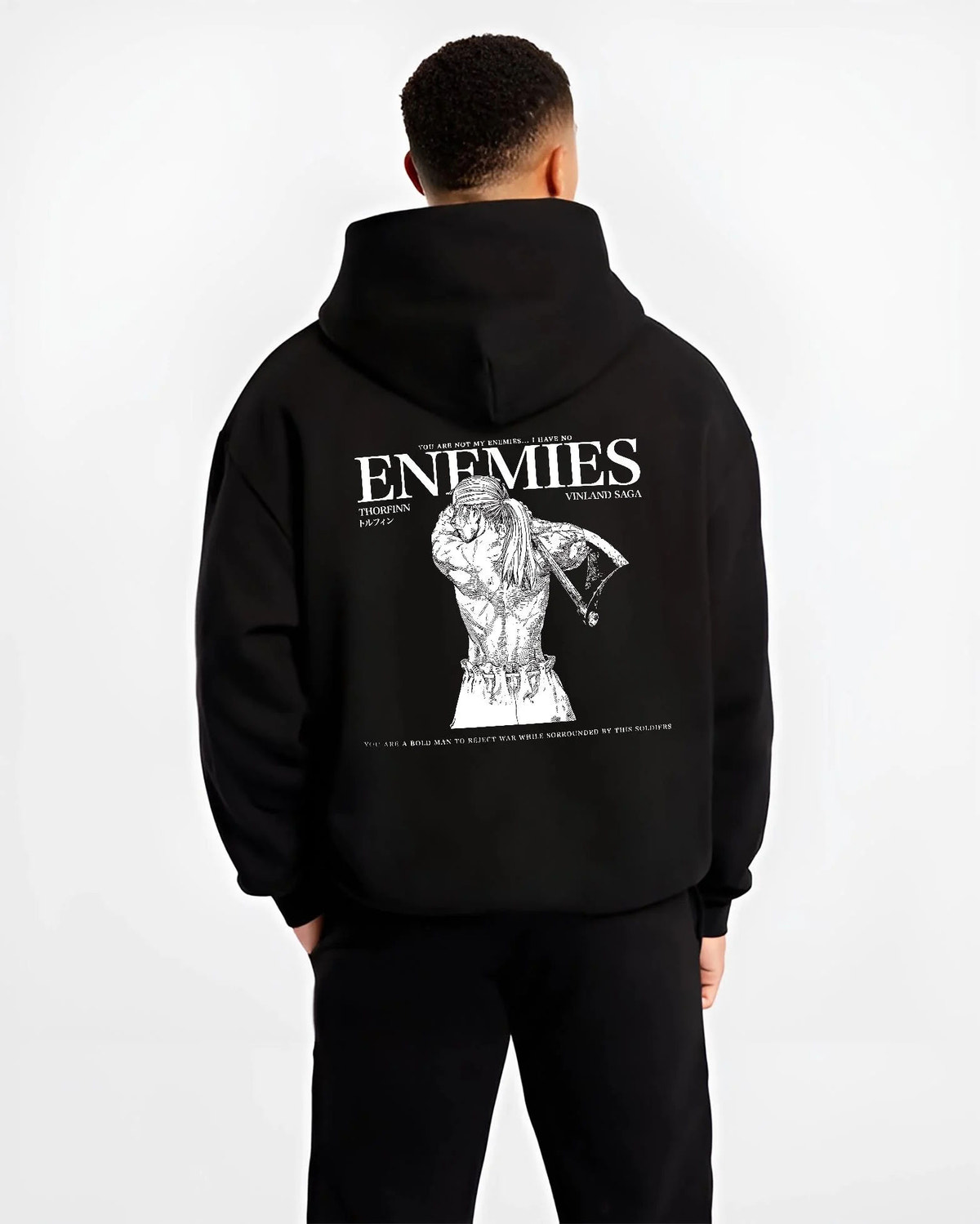 Black hoodie worn by male model from the back featuring Thorfinn enemies Viking revenge Vinland Saga artwork.