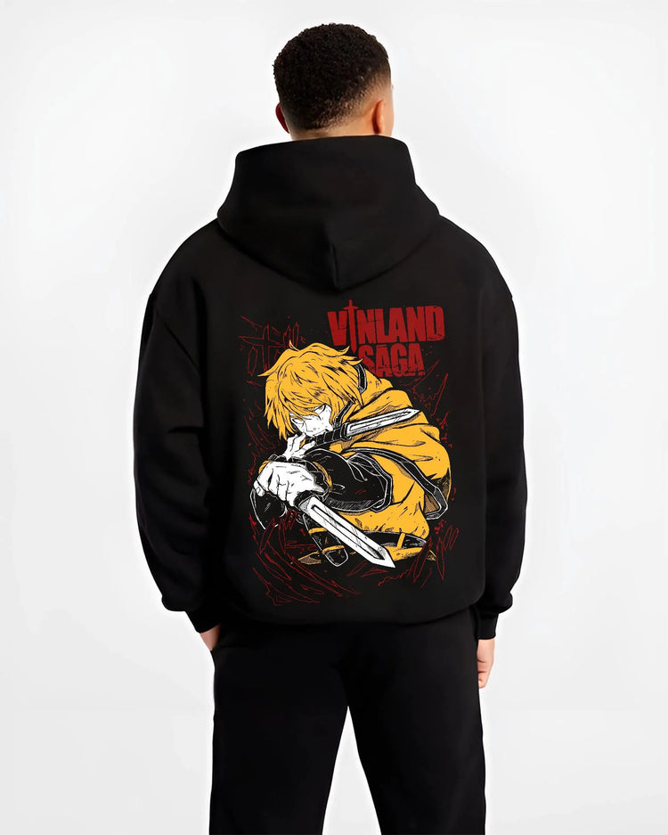 Black hoodie worn by male model from the back featuring Thorfinn Viking warrior dual blades Vinland Saga artwork.