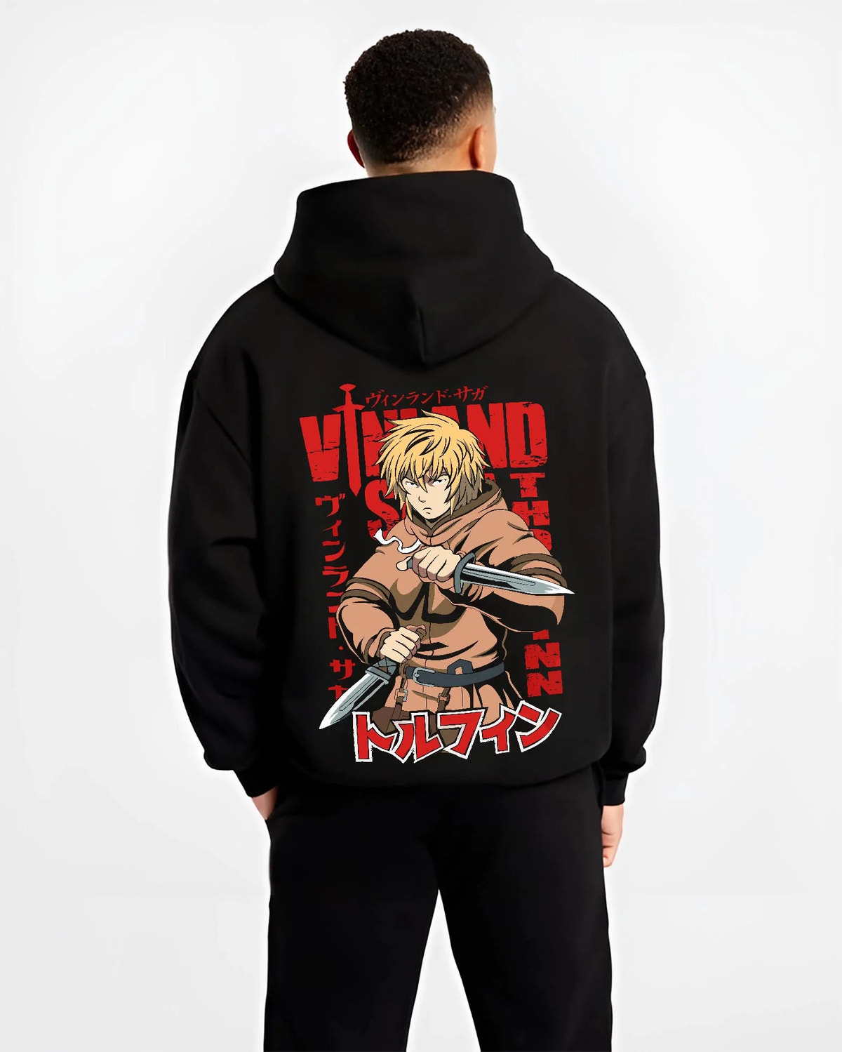 Black hoodie worn by male model from the back featuring Thorfinn dual daggers Viking warrior Vinland Saga artwork.
