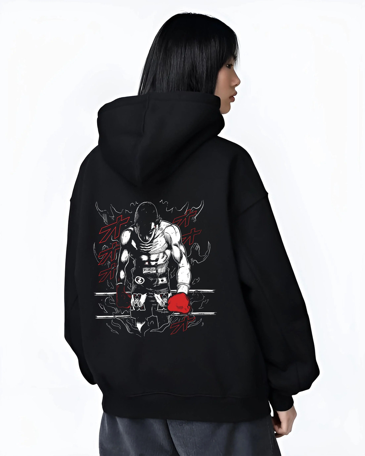 Black hoodie worn by female model from the back featuring Mamoru Takamura boxing champion Hajime no Ippo artwork.