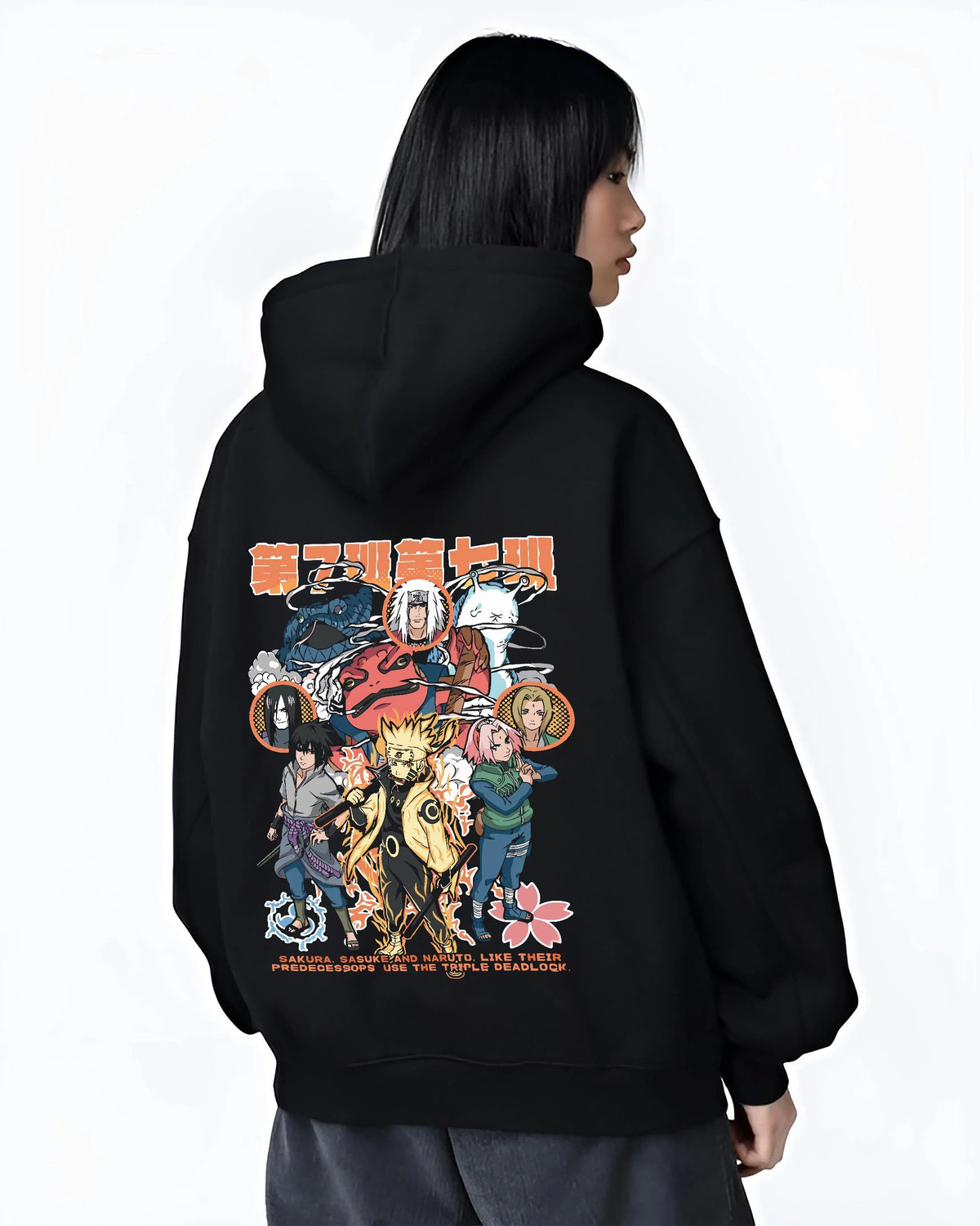 Black hoodie worn by female model from the back featuring Team 7 summoning jutsu ninja legacy Naruto artwork.