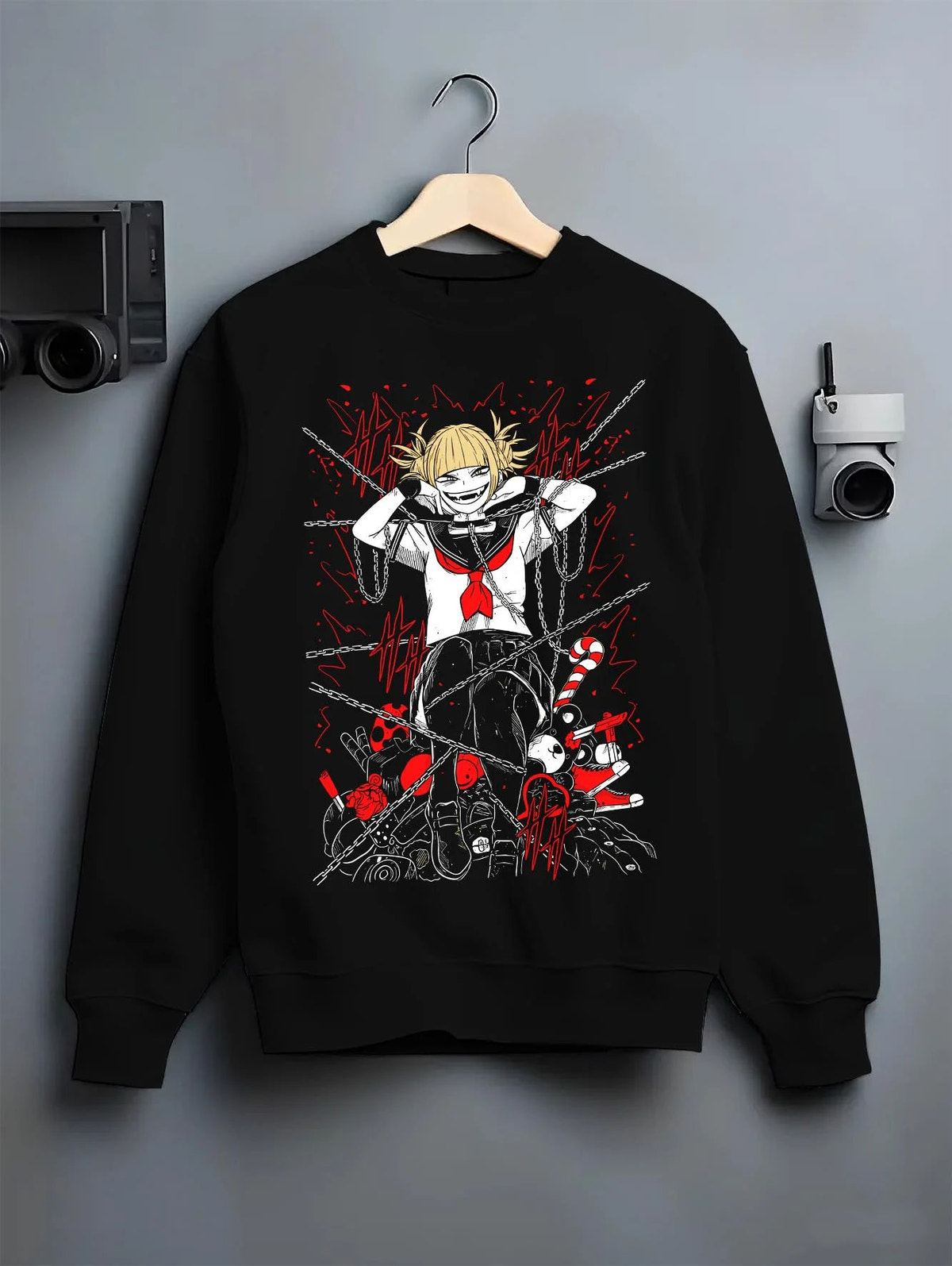 Black crewneck sweatshirt on hanger featuring Himiko Toga blood villain My Hero Academia artwork.