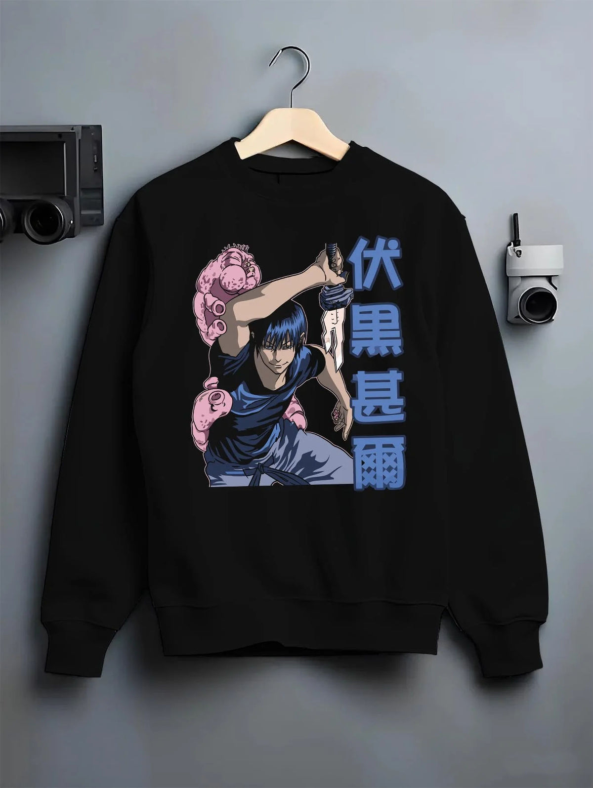 Black crewneck sweatshirt on hanger featuring Toji Fushiguro Inverted Spear power Jujutsu Kaisen artwork.