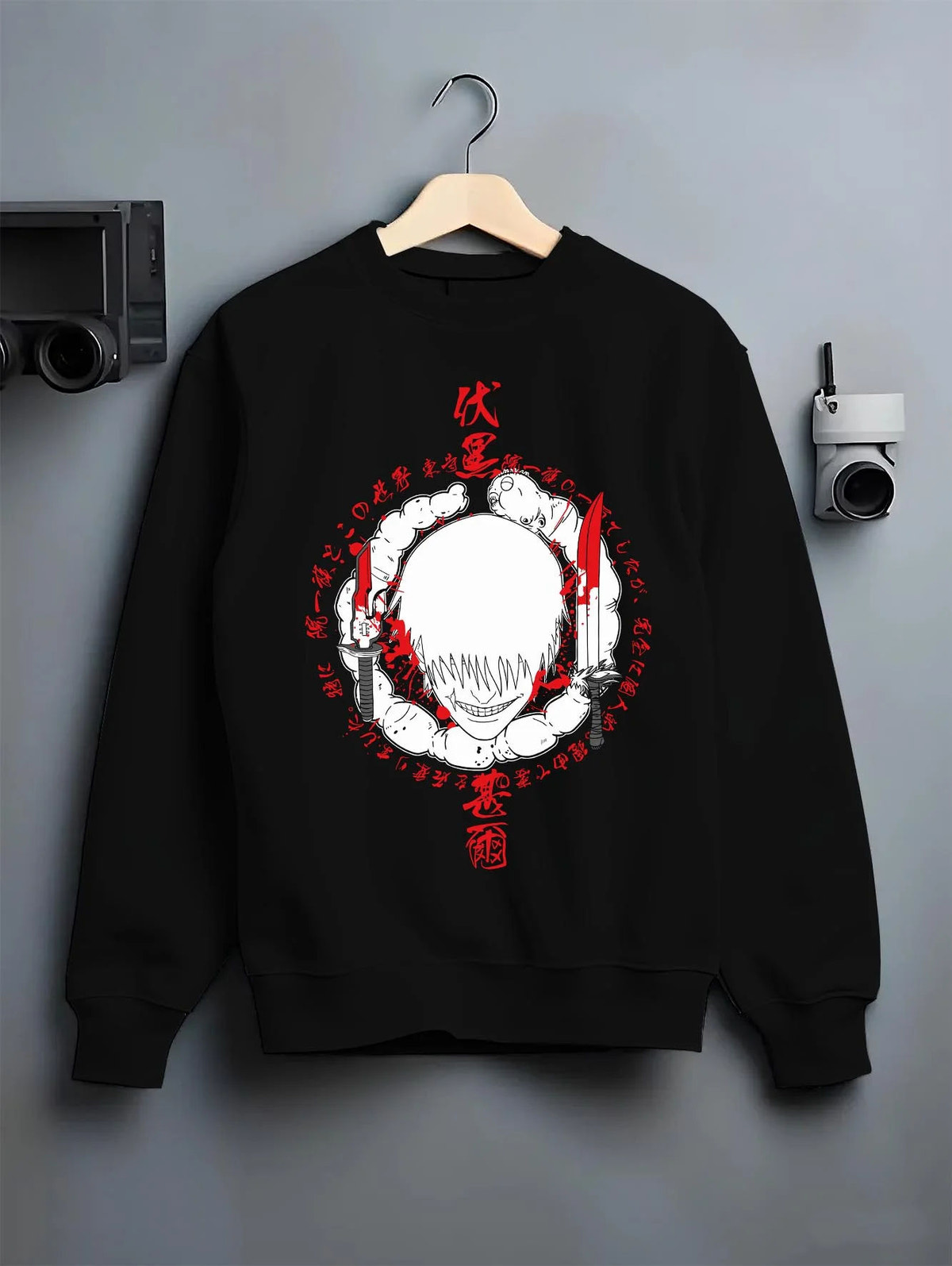 Black crewneck sweatshirt on hanger featuring Toji Fushiguro red Sorcerer Killer portrait Jujutsu Kaisen artwork.