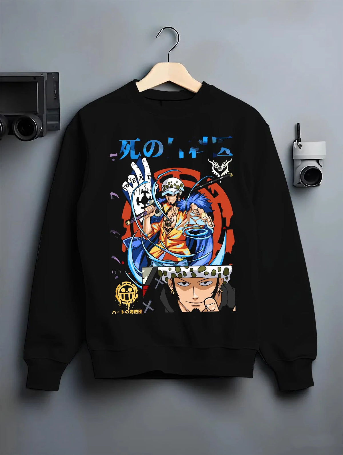 Black crewneck sweatshirt on hanger featuring Trafalgar Law Surgeon of Death ROOM power One Piece artwork.