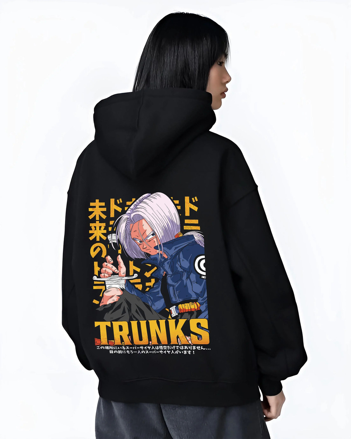 Black hoodie worn by female model from the back featuring Future Trunks blue hair sword Dragon Ball Super artwork.