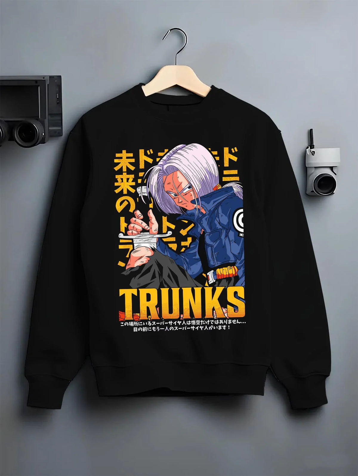 Black crewneck sweatshirt on hanger featuring Future Trunks blue hair sword Dragon Ball Super artwork.