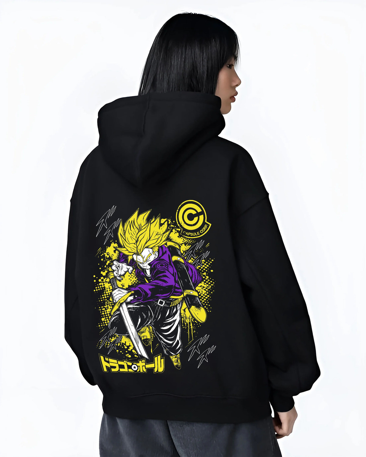 Black hoodie female model back view showing Future Trunks from Dragon Ball: Super Saiyan sword pose