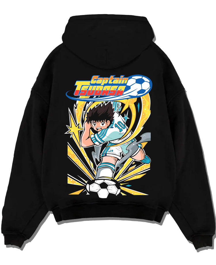 Black pullover hoodie laid flat with Tsubasa Hoodie Captain Tsubasa Soccer Kick Classic graphic bold anime graphic.