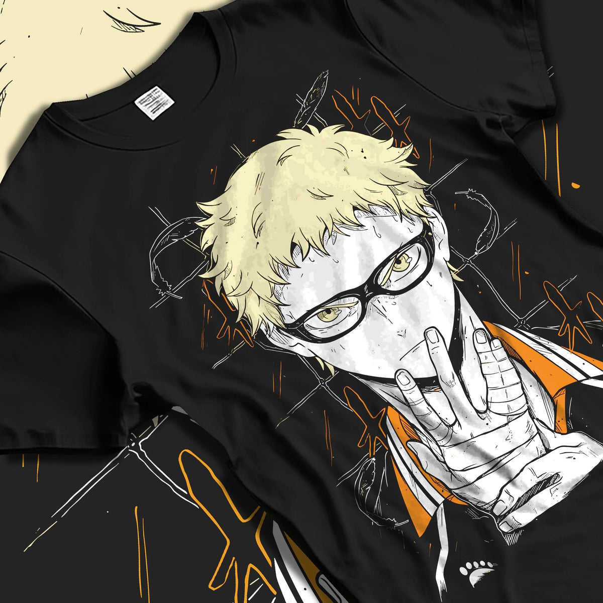 Black T-shirt laid flat with natural folds featuring Kei Tsukishima Karasuno blocker Haikyuu artwork.