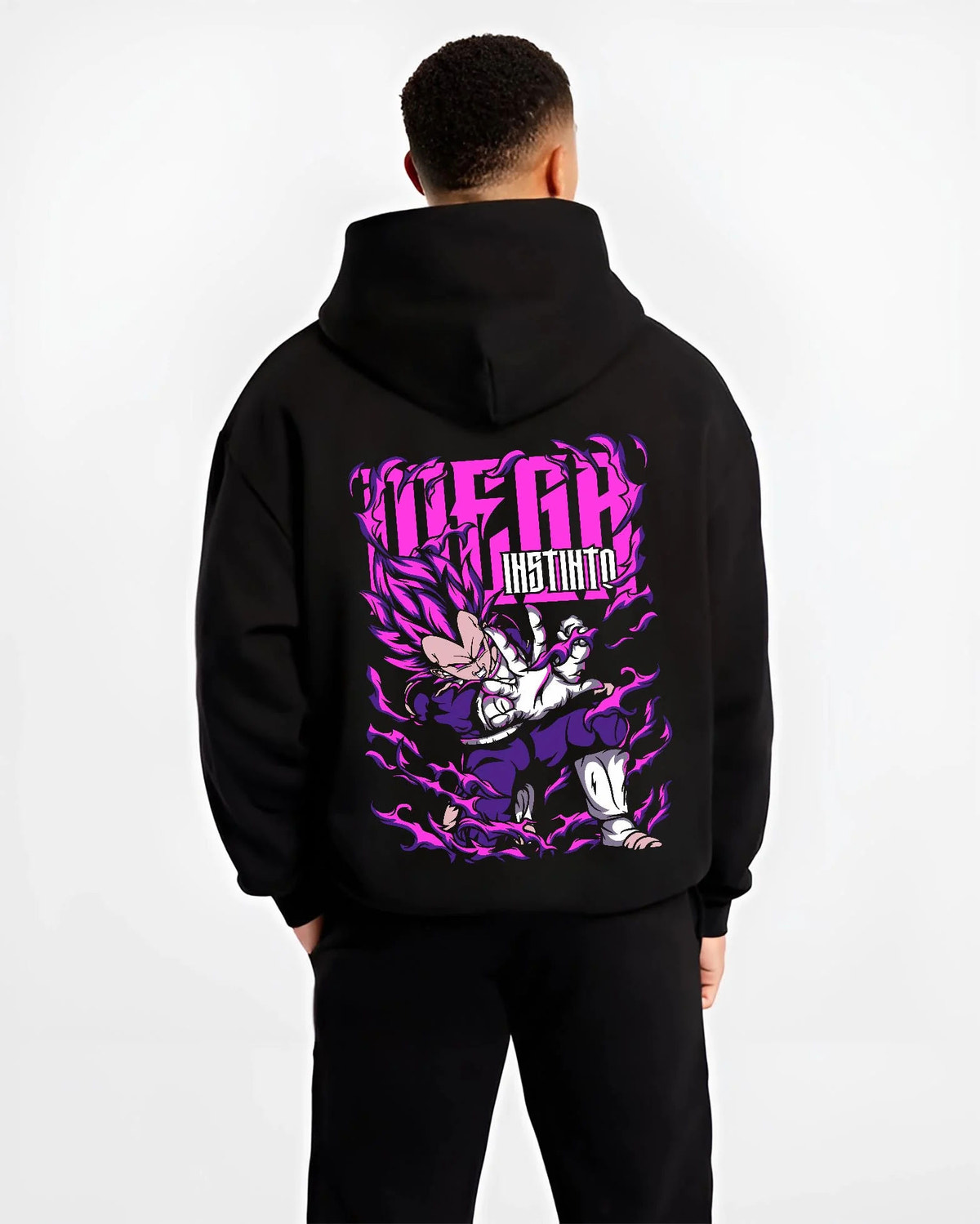 Black hoodie worn by male model from the back featuring Vegeta Ultra Ego purple destruction power Dragon Ball Super artwork.