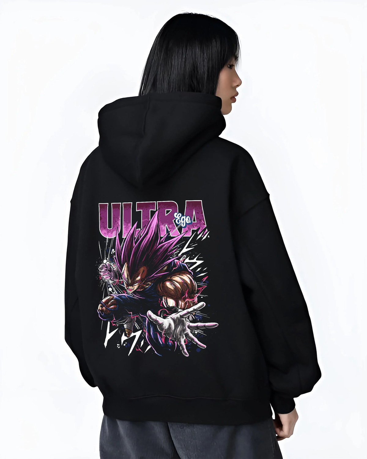 Black hoodie worn by female model from the back featuring Vegeta Ultra Ego purple battle power Dragon Ball Super artwork.