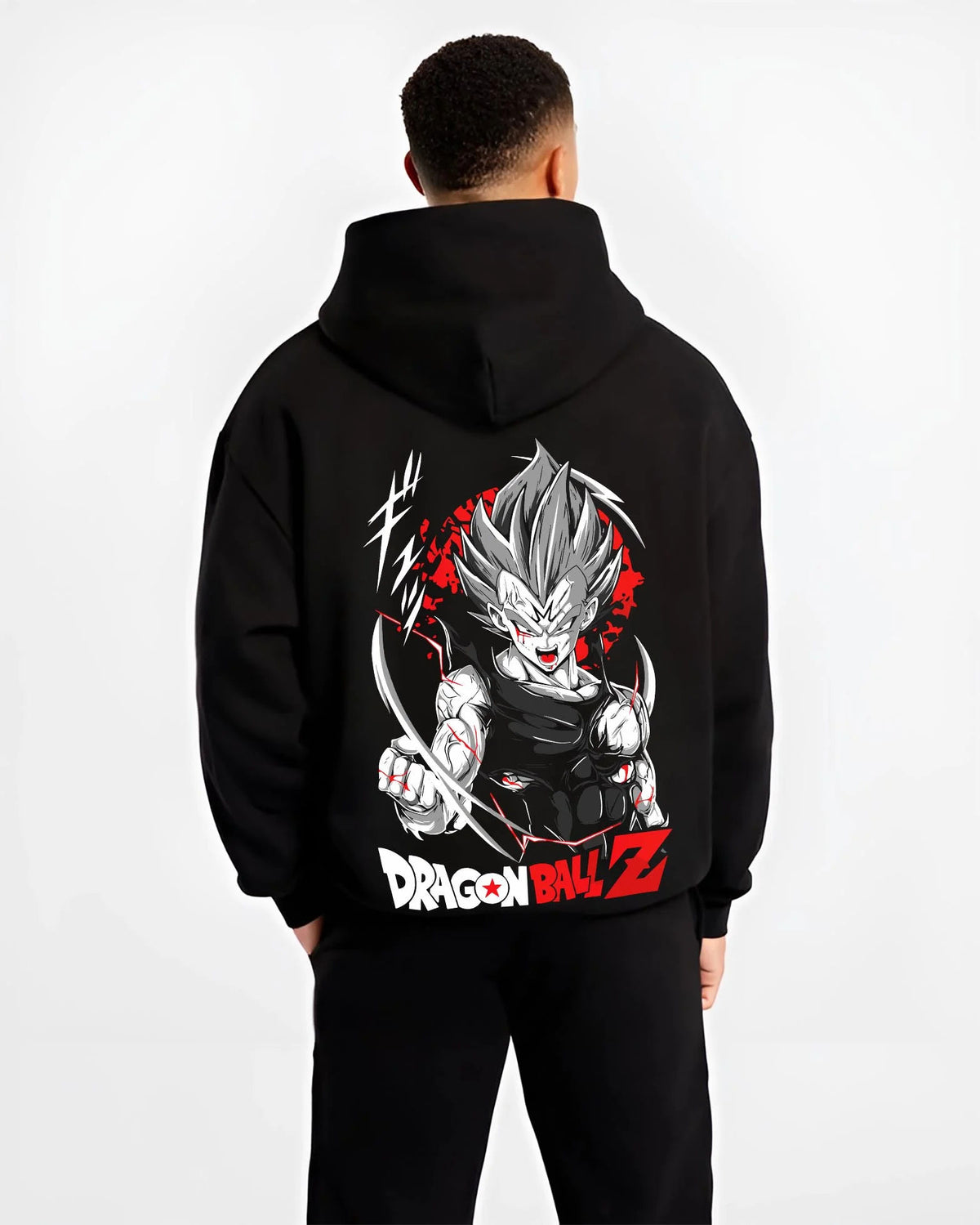 Black hoodie worn by male model from the back featuring Vegeta Ultra Ego God of Destruction power Dragon Ball Super artwork.