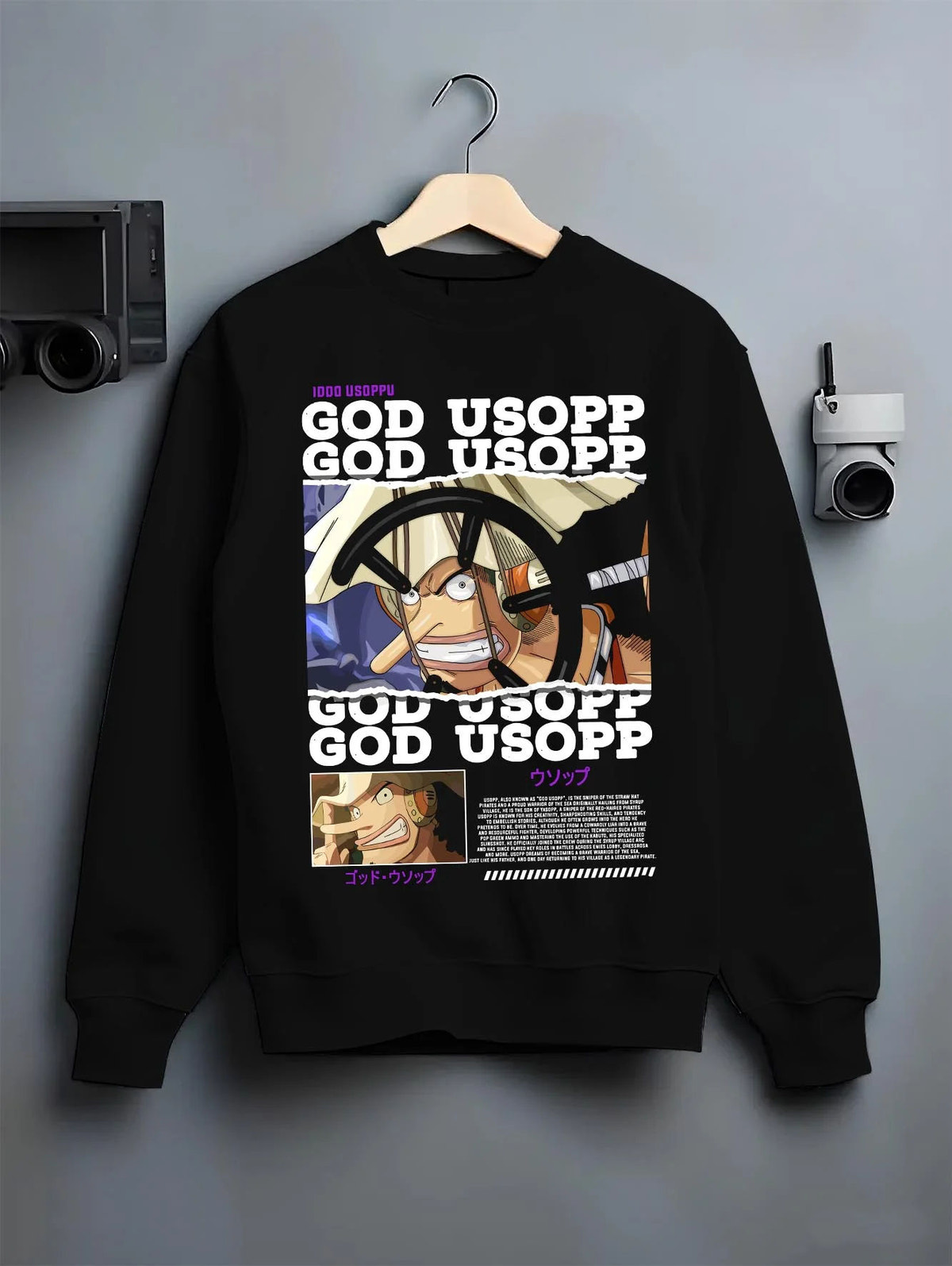 Black crewneck sweatshirt on hanger featuring God Usopp warrior sniper One Piece artwork.